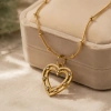 The hollow double-layer heart-shaped diamond-encrusted pendant has a unique texture and a sweet and cool style. The stainless steel snake bone chain can be layered and worn, making it a trendy and exquisite jewelry for young girls full image